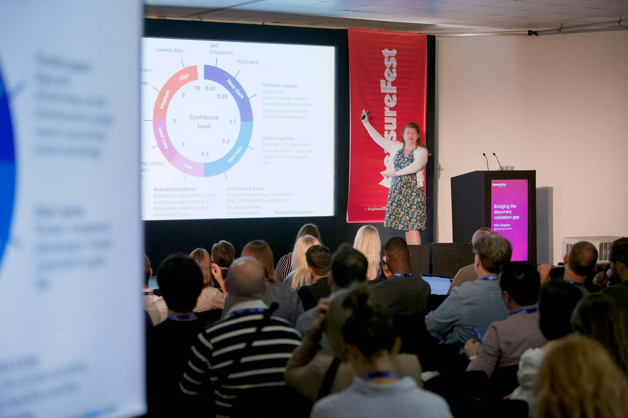 MeasureFest speaker on stage in front of the audience